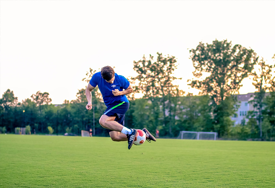 man doing soccer skills